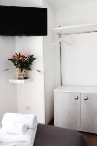 TV a/nebo společenská místnost v ubytování B&B Carlo V