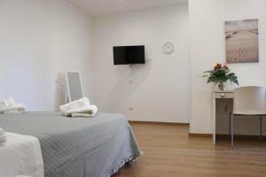 TV a/nebo společenská místnost v ubytování B&B Carlo V