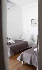 Postel nebo postele na pokoji v ubytování B&B Carlo V