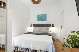 Posteľ alebo postele v izbe v ubytovaní Aurelia Residence