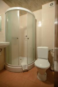 Koupelna v ubytování Dovbushanka Hotel