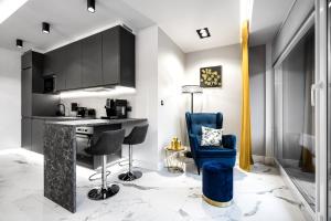 Kuchyňa alebo kuchynka v ubytovaní Apartament Zacisze z prywatną sauną