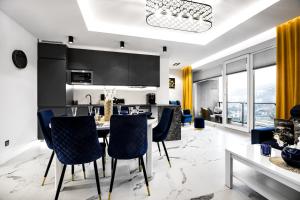 Kuchyňa alebo kuchynka v ubytovaní Apartament Zacisze z prywatną sauną