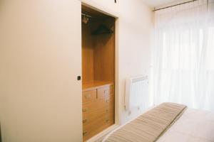 Postel nebo postele na pokoji v ubytování Bright apartment in the city center