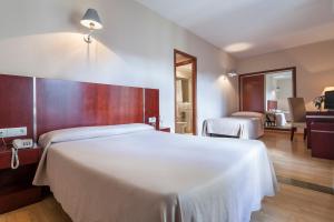 Cama o camas de una habitación en Crisol Riosol