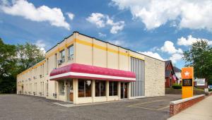 a large building with a red and yellow at M Star North Canton - Hall of Fame in North Canton