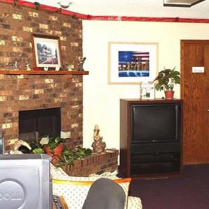 A television and/or entertainment center at Countryside Inn Motel Albert Lea