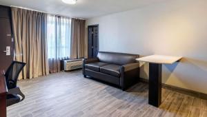 Posezení v ubytování Magnuson Grand Hotel and Conference Center Tyler