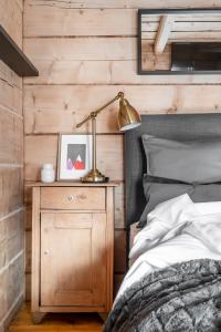 Postel nebo postele na pokoji v ubytování APARTAMENTY DVOOR1924