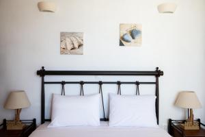 A bed or beds in a room at Natural Stone Villas