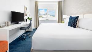 Ein Bett oder Betten in einem Zimmer der Unterkunft YVE Hotel Miami