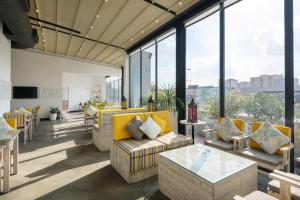 אזור ישיבה ב-Crowne Plaza Doha - The Business Park by IHG