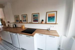 Кухня или мини-кухня в Le S&L - Hyper Centre
