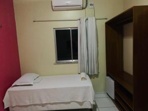 Pousada Luz - Santo Amaro do Maranhão客房内的一张或多张床位