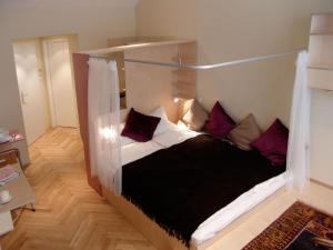 Postel nebo postele na pokoji v ubytování WANZ'inn Design Appartements