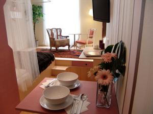 Telewizja i/lub zestaw kina domowego w obiekcie WANZ'inn Design Appartements
