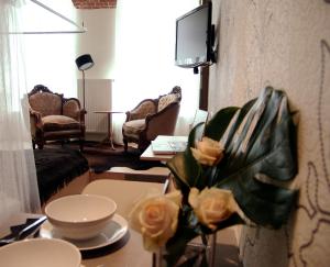 Telewizja i/lub zestaw kina domowego w obiekcie WANZ'inn Design Appartements