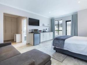 Η κουζίνα ή μικρή κουζίνα στο Rockpool - Pezula Golf Estate +6 φωτογραφίες