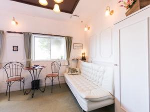 Posezení v ubytování Tabist Hotel Nizi Fuefuki Misaka