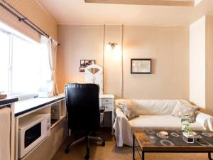 Kuchyň nebo kuchyňský kout v ubytování Tabist Hotel Nizi Fuefuki Misaka