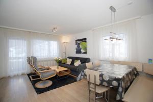 Posezení v ubytování Baron / Baronesse Apartments