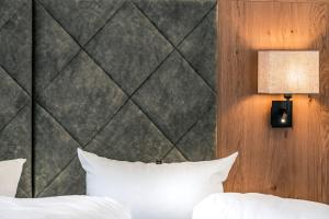 Katil atau katil-katil dalam bilik di Hotel Föhrenhof