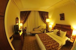 Voodi või voodid majutusasutuse Serenada Golden Palace - Boutique Hotel toas