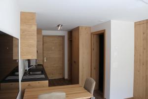 Kuchyň nebo kuchyňský kout v ubytování Studio Sunnublüäma + 2 fotografie