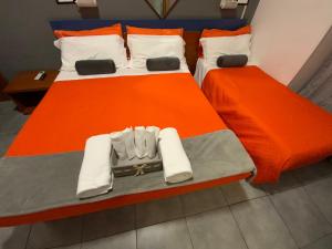 Postel nebo postele na pokoji v ubytování Albergo Villa Marina