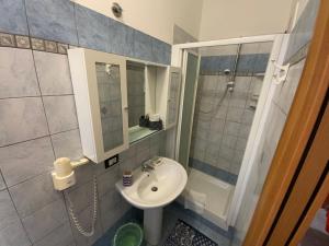 Koupelna v ubytování Albergo Villa Marina