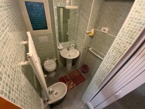 Koupelna v ubytování Albergo Villa Marina