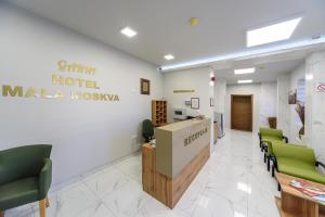 Kuchyň nebo kuchyňský kout v ubytování Garni Hotel Mala Moskva