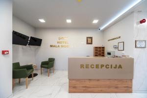Vstupní hala nebo recepce v ubytování Garni Hotel Mala Moskva