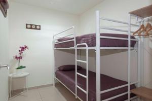 A bed or beds in a room at 1112 Mileni I - Apivend Immo Még 24 kép