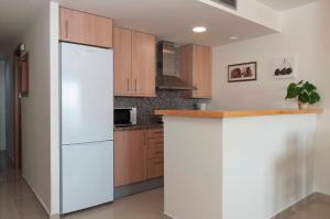 A kitchen or kitchenette at 1112 Mileni I - Apivend Immo