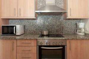 A kitchen or kitchenette at 1112 Mileni I - Apivend Immo
