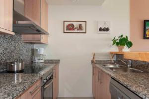 A kitchen or kitchenette at 1112 Mileni I - Apivend Immo