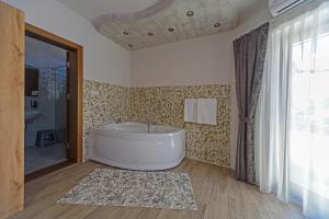 Koupelna v ubytování Garni Hotel Mala Moskva