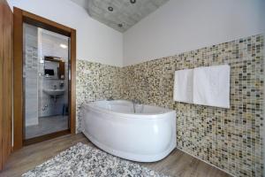 Koupelna v ubytování Garni Hotel Mala Moskva