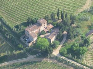 an aerial view of a house in a field at Corzano e Paterno in San Casciano in Val di Pesa