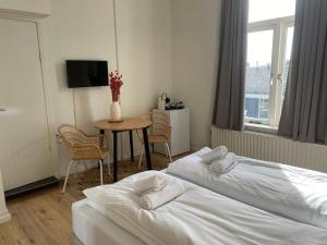 Krevet ili kreveti u jedinici u okviru objekta Hotel Doppenberg