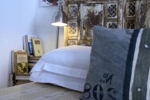 Postel nebo postele na pokoji v ubytování B&B Villa Giuliana