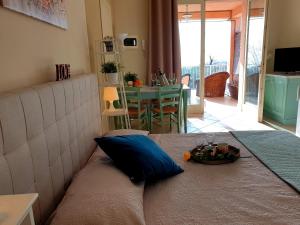 Cama o camas de una habitación en Residence Il Fiore Del Garda