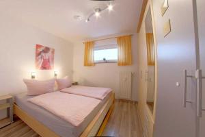 Postel nebo postele na pokoji v ubytování Apartment 570