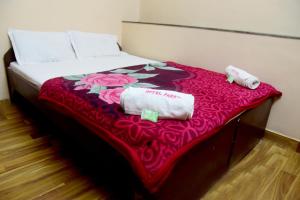 Postel nebo postele na pokoji v ubytování Hotel Parag