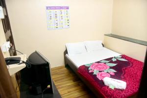 Postel nebo postele na pokoji v ubytování Hotel Parag