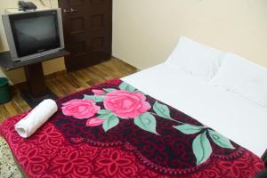 Postel nebo postele na pokoji v ubytování Hotel Parag