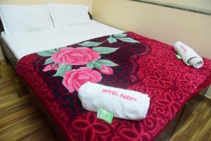Postel nebo postele na pokoji v ubytování Hotel Parag