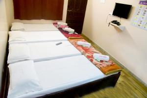 Postel nebo postele na pokoji v ubytování Hotel Parag