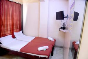 Postel nebo postele na pokoji v ubytování Hotel Parag
